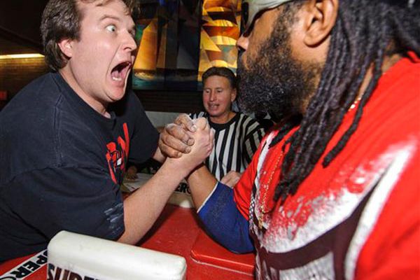 Gary Roberts from California screams at David Milburn during a long match at the 33rd Annual Empire State Golden Arm Wrestling Championships